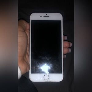 iPhone 8 glass back has 2 cracks on the screen,cracked back camera used fair .